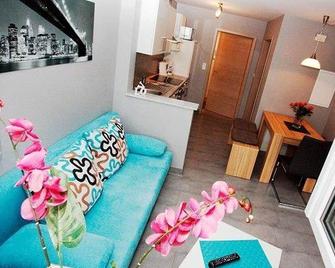 Vacation apartment 5, 55sqm, 2 bedrooms, max. 5 persons - Rust - Living room