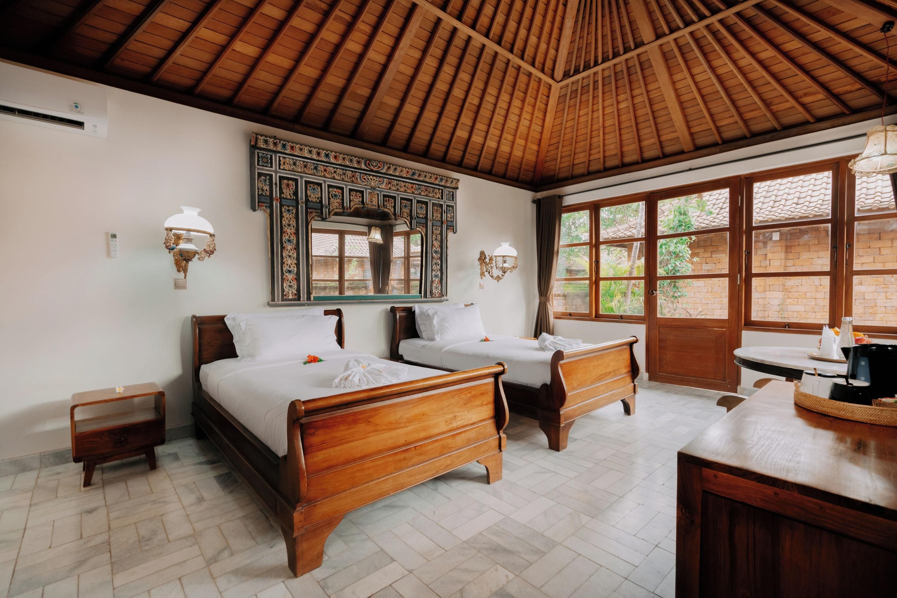 The Ariras Resort - Manggis - חדר שינה