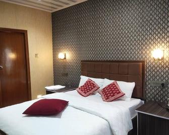 Blossom Springs - Ooty - Спальня