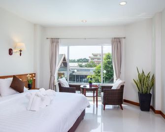 Kanchanaburi City Hotel - קאנצ'אנאבורי - חדר שינה