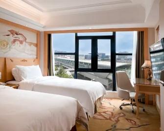 Vienna Hotel Shenzhen Qinghu Metro Station - Shenzhen - Habitación