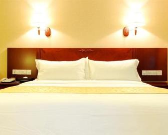 Vienna Classic Hotel Ganzhou Meilin - Ganzhou - Slaapkamer