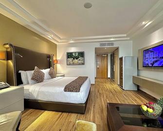 Victoria Crown Plaza Hotel - Lagos - Schlafzimmer