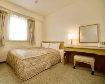 Kurashiki Ekimae Universal Hotel - Kurashiki - Schlafzimmer