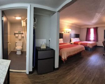 Budget Inn - Carthage - Bedroom