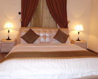 Al Nabarees Al Masi Hotel - Djedda - Slaapkamer