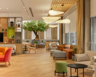 Holiday Inn Almaty by IHG - Almaty - Lounge