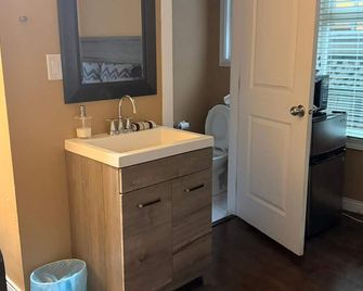 Small, renovated, private 1 bedroom bathroom in front of bus stop to downtown. - Vancouver