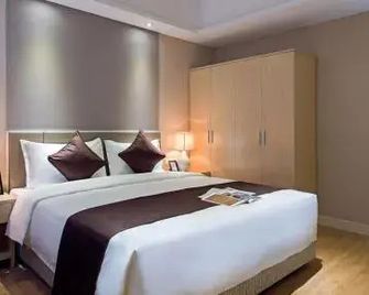 Tujia Somerset Palm Springs Chongqing Serviced Residence - Chongqing - Kamar Tidur