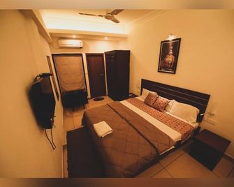 Rampart Apartments - Cochín - Habitación