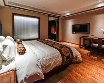 Metropolo Jinxiu Hotel - Zhangjiajie - Habitación