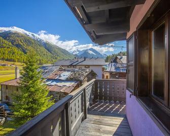 Casa Cisi ski in-Ski out 20m - Happy Rentals - Livigno - Balcony