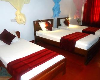 White Sand Beach Inn - Nilaveli - Habitación