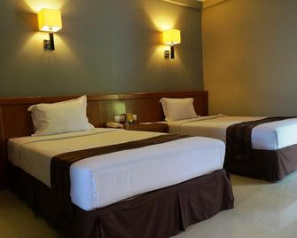 Hotel Asri Cirebon - Cirebon - Schlafzimmer