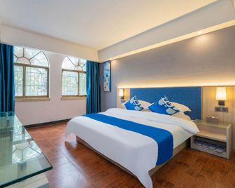 OYO 9 Long Hotel - Qinzhou - Slaapkamer
