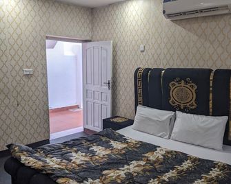 Swiss Lodges - Islamabad - Camera da letto
