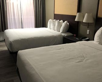 Green Palms Extended Stay - Kissimmee - Bedroom