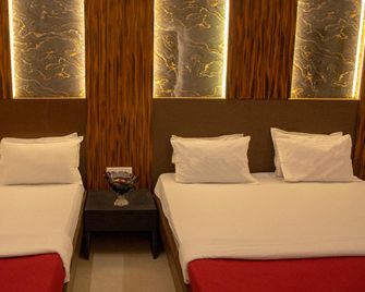 Empire Royale Hotel - Mumbai - Phòng ngủ