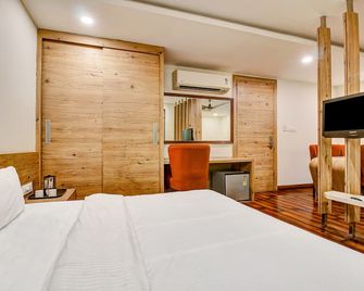 Fabhotel Prime Manjeet - Bhopal - Phòng ngủ