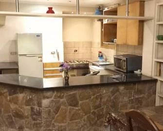 Lovely, Luxe 3 Bedroom Flat in Best Spot In Mohandseen ,Cairo - Mit-Rahineh - Kitchen