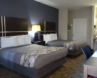 Regency Inn & Suites - Baytown - בייטאון - חדר שינה