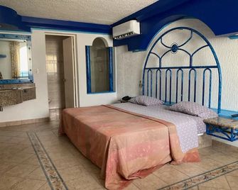 Hotel Oasis Acapulco - Acapulco - Makuuhuone
