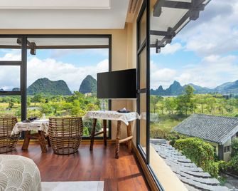 Guilin Village Creek Inn - Guilin - Balcón