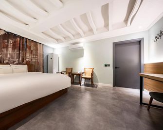 Mokpo New Ever Green Hotel - Mokpo - Schlafzimmer