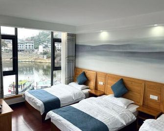 Shendu Shanshui Farmer's Hostel - הואנגשאן - חדר שינה