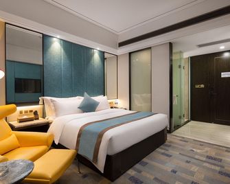 Pefiman Hotel - צ'נגשה - חדר שינה