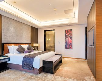 New Century Grand Hotel Siyang - Suqian - Bedroom