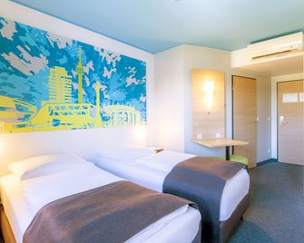 B&B Hotel Stuttgart-City - Stuttgart - Bedroom