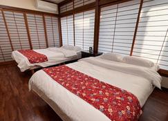 Hondori Inn - Hiroshima - Schlafzimmer