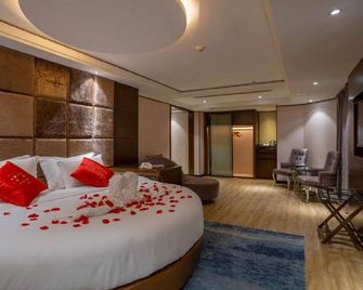 Universal International Hotel - Zhanjiang - Slaapkamer