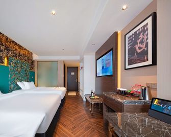 Zhangjiajie Metropolo Hotel - Zhangjiajie - Bedroom