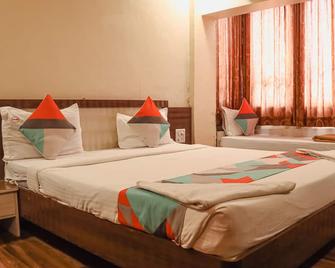 Hotel Mukesh Residency - Pune - Schlafzimmer