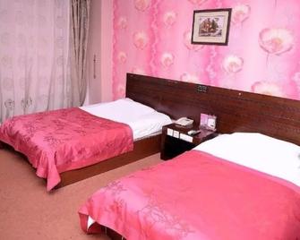 Baijiacheng Business Hotel - Harbin - Bedroom