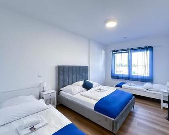 Suite4me - Balkon I Küche I Waschmaschine I Mainz-Kostheim - Wiesbaden - Bedroom