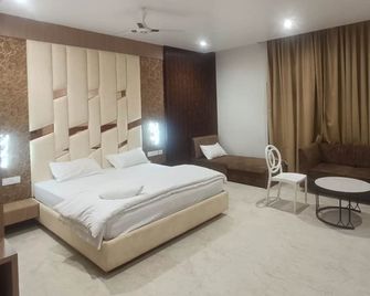 Hotel Satkar Inn - Katni - Bedroom