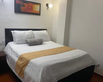 Hotel Avenida 3 Real en el norte de Cali - Калі - Спальня