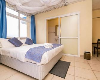 Rusinga Blue Ridge Hotel - Mbita - Bedroom