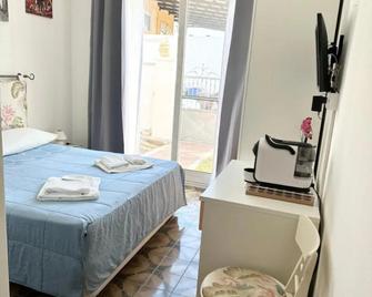 Garden House - أولبيا - غرفة نوم