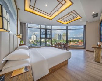 Youmu Hotel - Liangshan - Slaapkamer