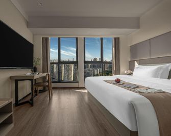 Mido Hotel (Chongqing North Railway Station Branch) - Chongqing - Camera da letto