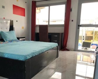 Large American Studio II - Abidjan - Bedroom