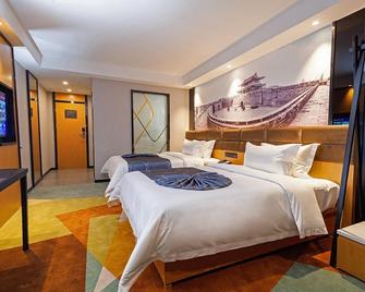 Chonpines Hotel Jingzhou Ancient City Dongmen - Jingzhou - Slaapkamer