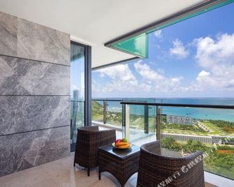 Serenity Coast Fusheng Seaview Holiday Apartment - Sanya - Balcony