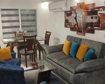 Reserva y disfruta de tus vacaciones en la sucursal del cuelo - Cali - Living room