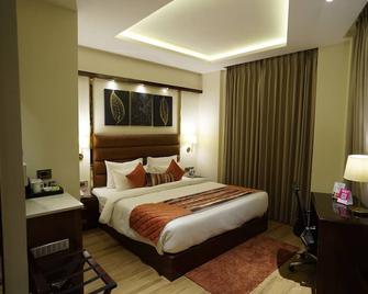 Regenta Inn Amritsar Airport Road - Amritsar - Bedroom