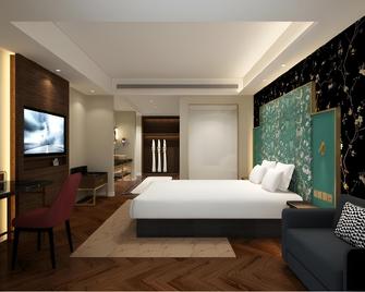 Jinjiang Metropolo Hotel - Taizhou Wanda Plaza - Taizhou - Bedroom